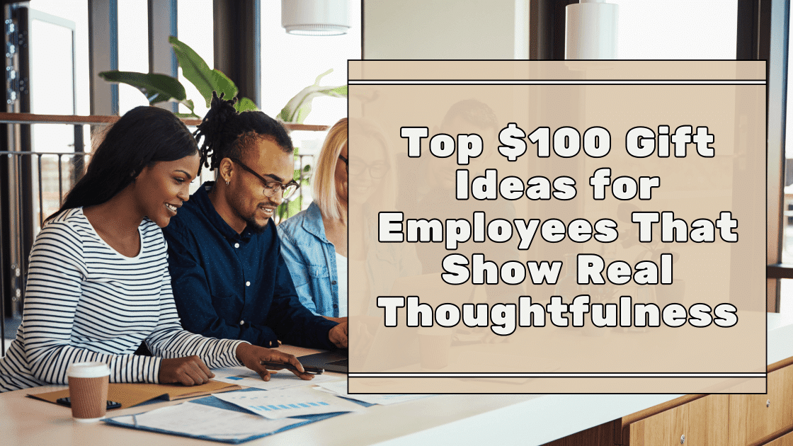 Two people collaborating at a table with a laptop