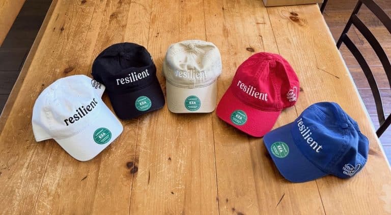 Resilient embroidered hats in white, black, tan, red, and blue