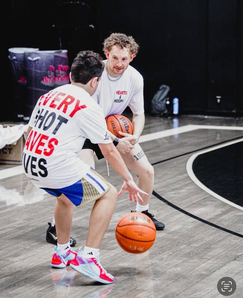 Hearts and Hoops basketball fundraiser players in custom shirts