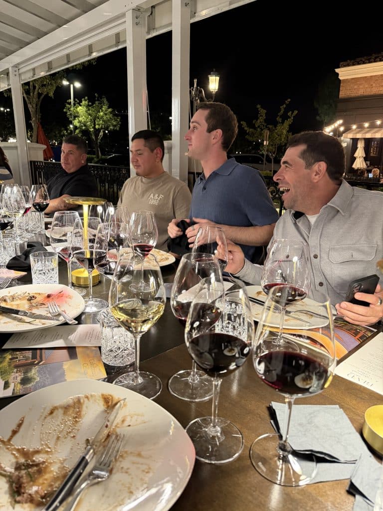 JNP teammates enjoying conversation during the six-course dinner