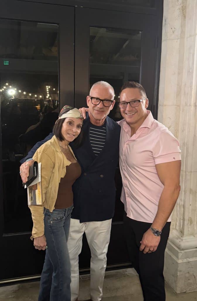 Three guests posing together during JNP's Q4 kickoff evening